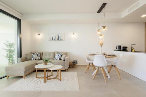 Modern apartment with a large private terrace, pool, sauna, gym, and sea views in Fuengirola
