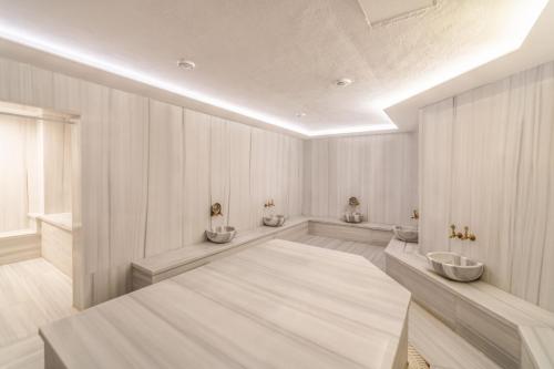 Katil atau katil-katil dalam bilik di Questa Thermal & Spa Hotel