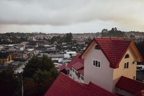 a view of a city with a red roof at Park Inn by Radisson Puerto Varas in Puerto Varas