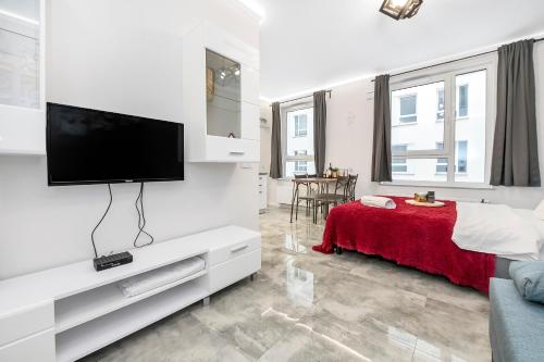 Et tv og/eller underholdning på Lumina comfy apart near the railway station