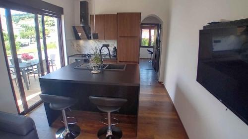 Kuchyňa alebo kuchynka v ubytovaní Kampor Apartment 3