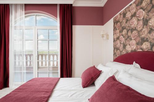 En eller flere senge i et værelse på Bononia Estate Winery & Resort