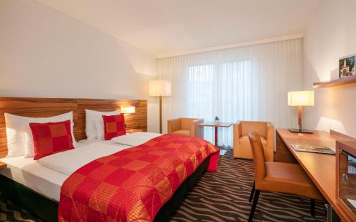 Katil atau katil-katil dalam bilik di ARCOTEL Castellani Salzburg
