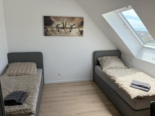 Ένα ή περισσότερα κρεβάτια σε δωμάτιο στο Apartments Leimen