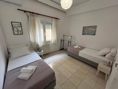Кровать или кровати в номере Hermanos City Apartment's