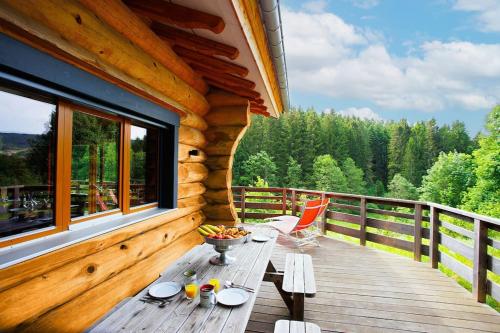 Original chalet en rondins, l'Ours Canadien