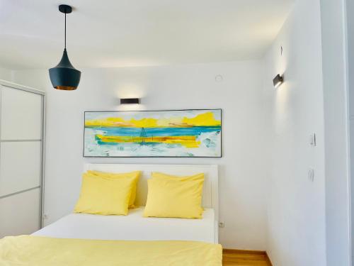 En eller flere senge i et værelse på Seasight