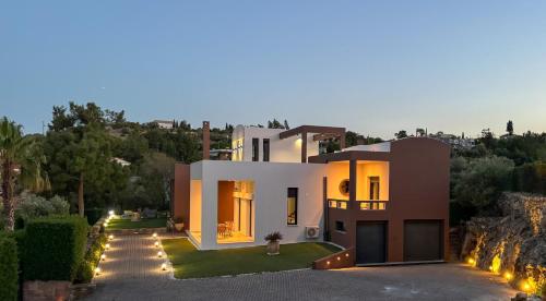 a villa with a view of a house at Residenza di Lusso in Chios