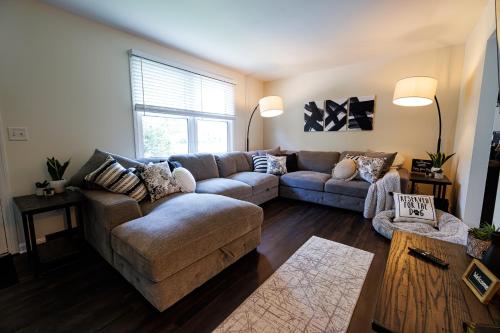 a living room with a couch and a table at The Cooper Home, Dogs Welcome! in Ephrata