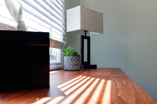 a room with a light shining through a large window at The Cooper Home, Dogs Welcome! in Ephrata