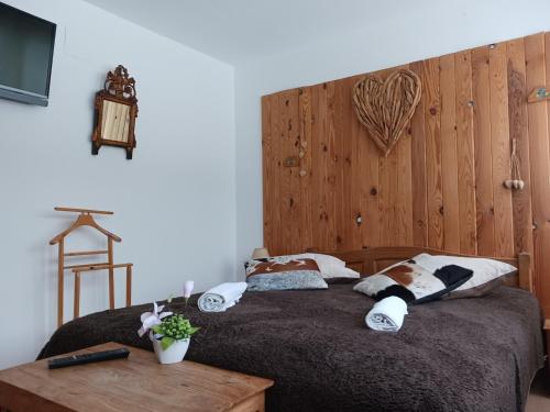 Postel nebo postele na pokoji v ubytování Domaine Des Hauts Viaux