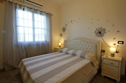 Cama o camas de una habitación en Casetta Patrizia