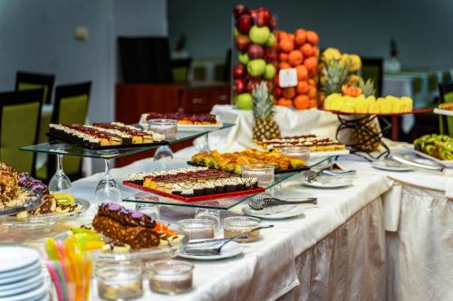 a buffet table with many different types of food at MPM Hotel Guinness in Bansko
