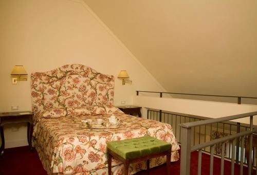 Postel nebo postele na pokoji v ubytování Grand Hotel Majestic