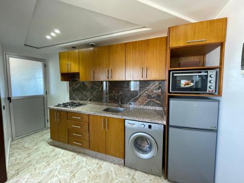 Kuchyň nebo kuchyňský kout v ubytování Hiba apartments