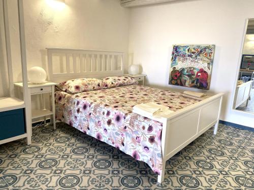 Кровать или кровати в номере La Mia Valigia a Stromboli