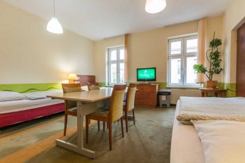 Ένα ή περισσότερα κρεβάτια σε δωμάτιο στο Hostel Nina