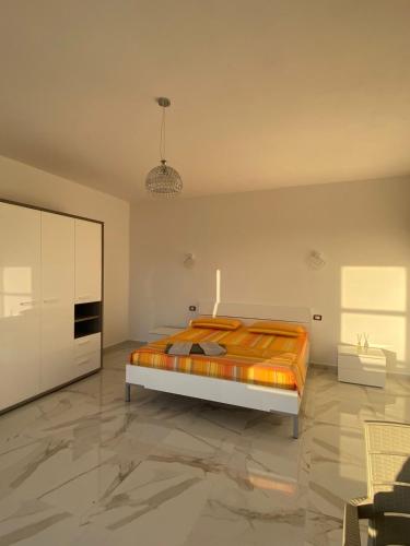 Ένα ή περισσότερα κρεβάτια σε δωμάτιο στο Villa Cepeli