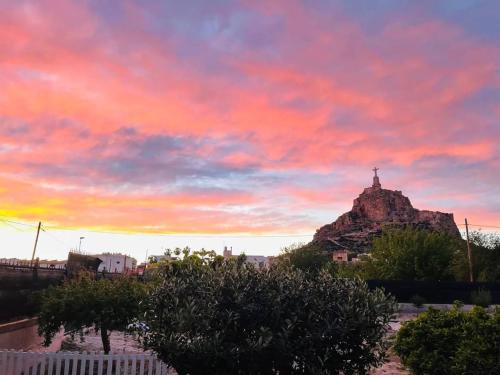 a view of a mountain with a cloudy sky at Tiny house deluxe para escapada con Jacuzzi in Murcia
