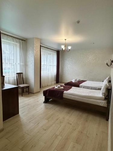 Кровать или кровати в номере Gold Palace Wellness & Spa
