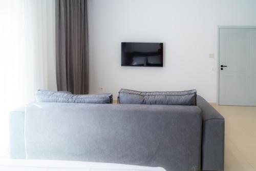 Enea Room in Centerにあるテレビまたはエンターテインメントセンター