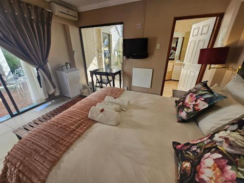 Letto o letti in una camera di Bettie's Luxury Lodge