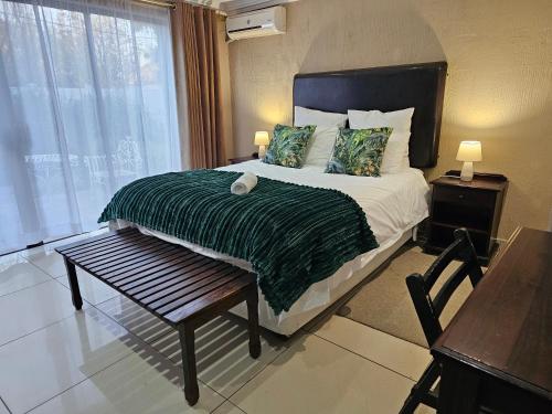 Letto o letti in una camera di Bettie's Luxury Lodge