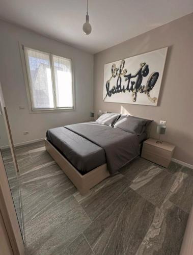 Una cama o camas en una habitación de Lux Flat Sesto