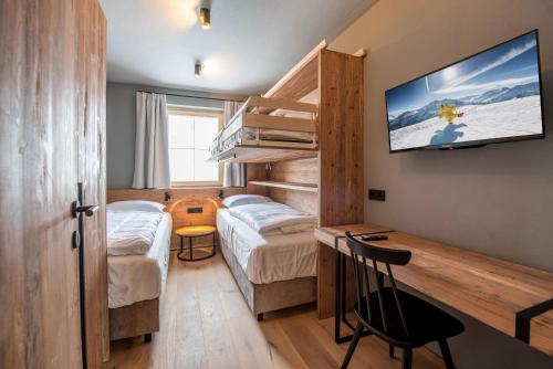 Postel nebo postele na pokoji v ubytování Filzsteinresort Wohnungen Top 6