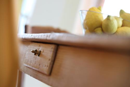 a close up of a wooden box with pears on it at Back2Front in Boezinge