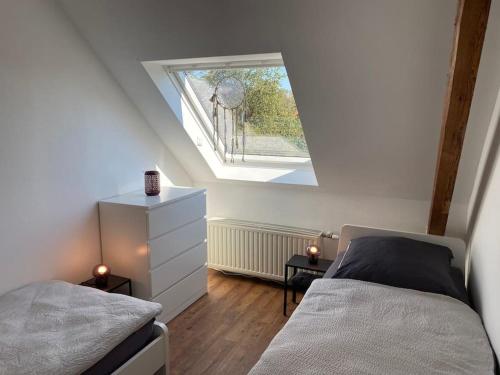 Katil atau katil-katil dalam bilik di Worker Place Bedburg Hau