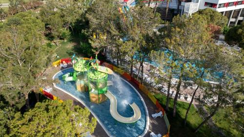 an aerial view of a water park with a roller coaster at Megasaray Resort Side in Side