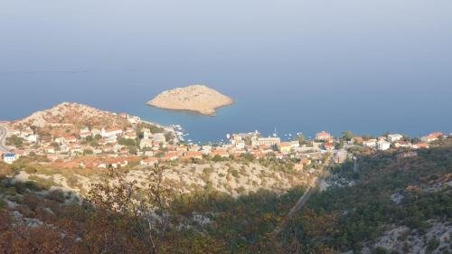 a small island on top of a mountain at Apartments Klara in Sveti Juraj