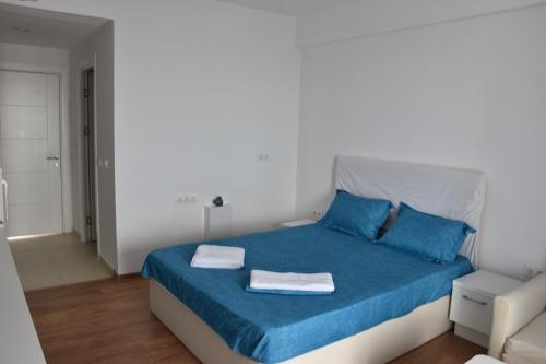 Postel nebo postele na pokoji v ubytování Sunrise Blaxy Resort OLIMP by Alice - wonderful SEA VIEW 10th floor