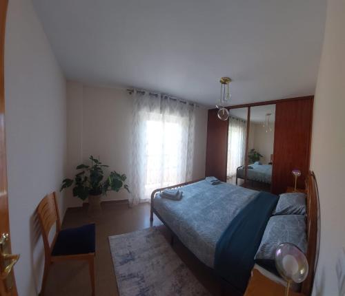 Postel nebo postele na pokoji v ubytování CostaTropical