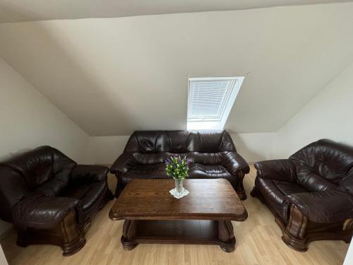 Posezení v ubytování Rodinné apartmány Villa Familia