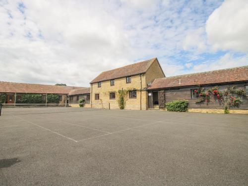 an empty parking lot in front of a building at The Park in Craven Arms