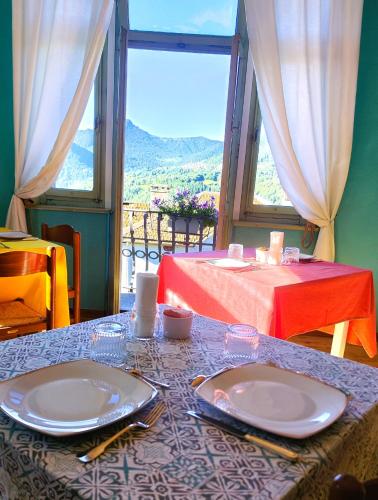 Nespecifikovaný výhled na hory nebo výhled na hory při pohledu z bed and breakfast