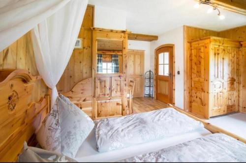 Postel nebo postele na pokoji v ubytování Hauslhof