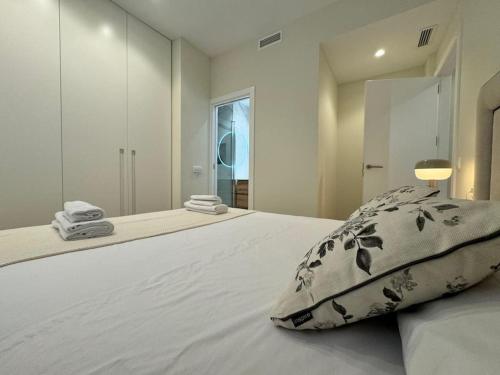 En eller flere senge i et værelse på Como en casa