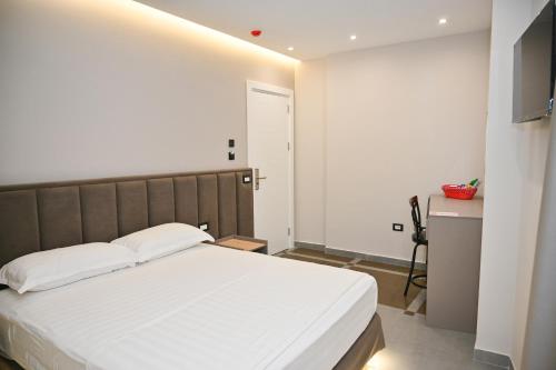 Katil atau katil-katil dalam bilik di Hotel Vila Emes