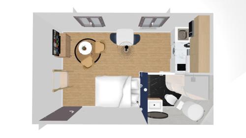 eine Zeichnung eines Zimmers mit einem Schlafzimmer in der Unterkunft Le Deep Blue - Home Homy in Niort