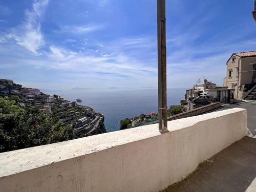 a view of the ocean from a wall at Amalfi Rooms Duoglio Beach -amazing seaview in Amalfi