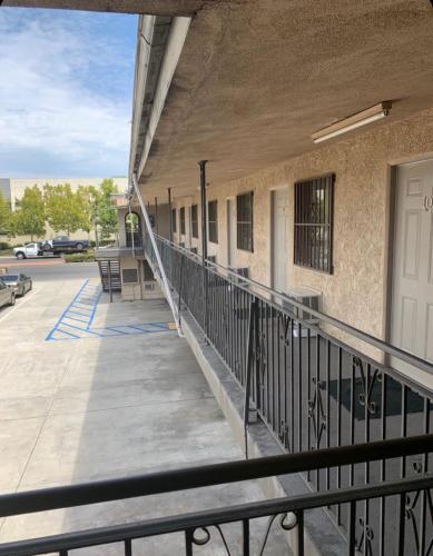 an outside view of a building with a balcony at Hi Rise Motel in Lynwood
