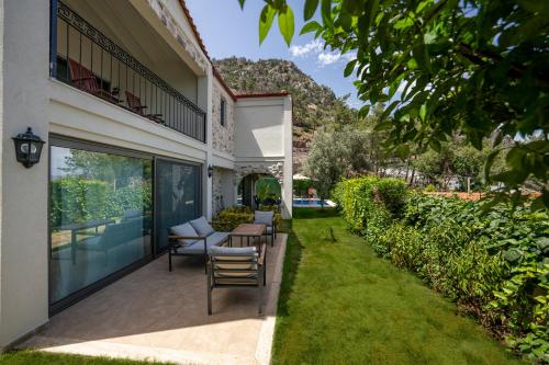 Κήπος έξω από το Alya Villa Butik Hotel
