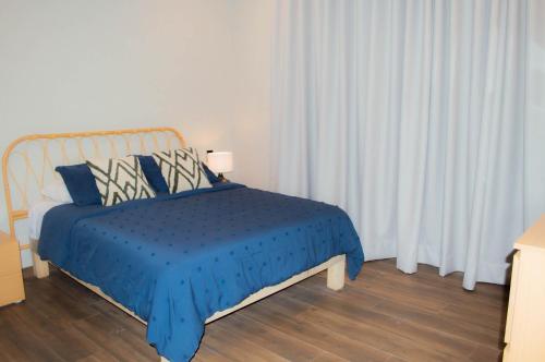 Ένα ή περισσότερα κρεβάτια σε δωμάτιο στο Hermoso y nuevo dpto a pie de playa