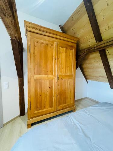Postel nebo postele na pokoji v ubytování Gîte du Tonnelier