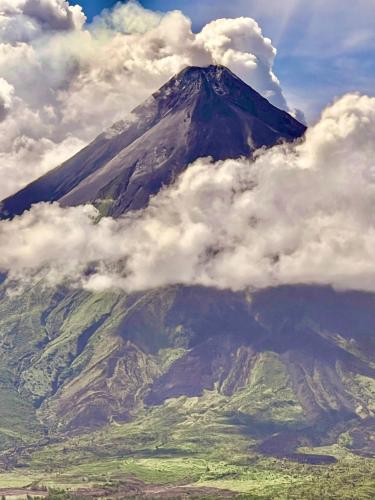 a mountain with cloudsigunigunigunigunigunigunigunigunigun at Balay na Bato in Legazpi