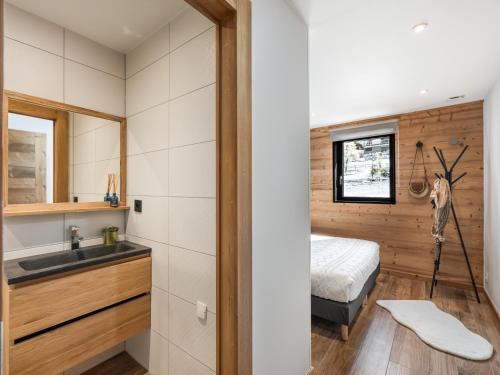 Ένα μπάνιο στο Apt L'attique - BO Immobilier - Reduced prices on ski passes Châtel & Portes du Soleil