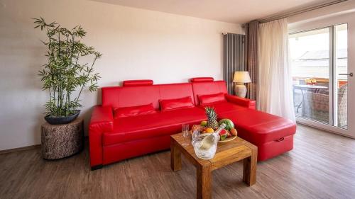 Posezení v ubytování Ferienwohnung Maaridyll - im Maarberg Resort - in Schalkenmehren am See